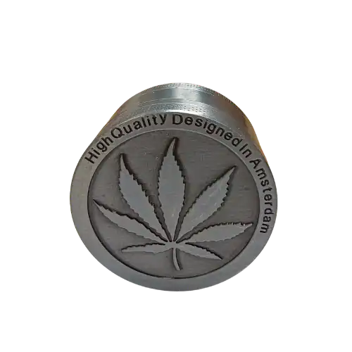Grinder en métal gravé avec feuille de cannabis - Amsterdam Quality