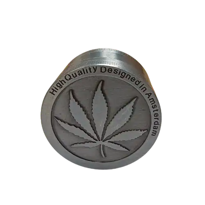Grinder en métal gravé avec feuille de cannabis - Amsterdam Quality